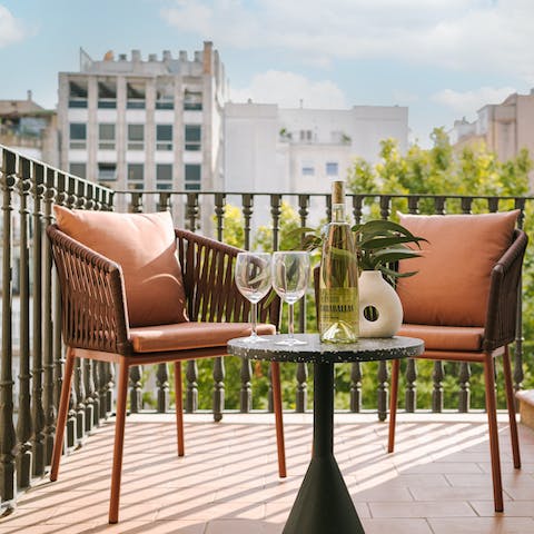 Drink up the views with sundowners on your private balcony