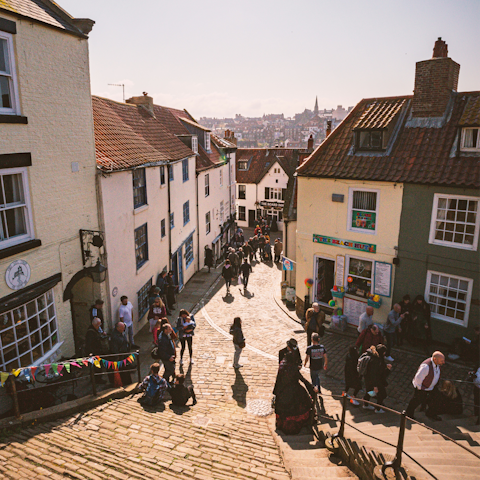 Wander through the historic centre to a local pub