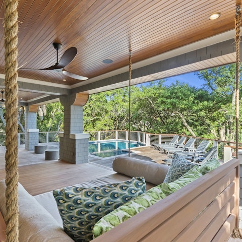 Sip mint juleps on the swing seat overlooking the pool