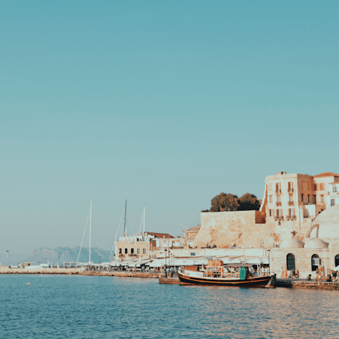 Soak up the Venetian splendour of Chania, just a twenty-minute drive away