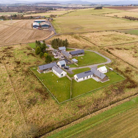 Stay on a family farm outside Aberdeen, surrounded by rolling fields