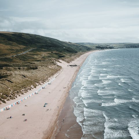 Spend sunny days enjoying miles of golden sand at Woolacombe, a little over half an hour's drive