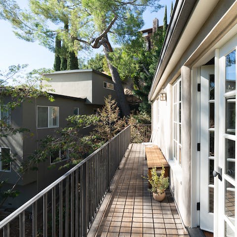 Take your morning meditation on the sunny wraparound balcony