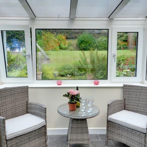 Sip your morning coffee in the calm conservatory