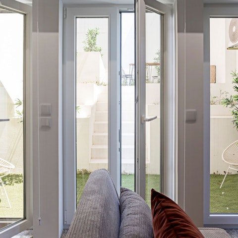 Step out of the living area and into the sunny garden