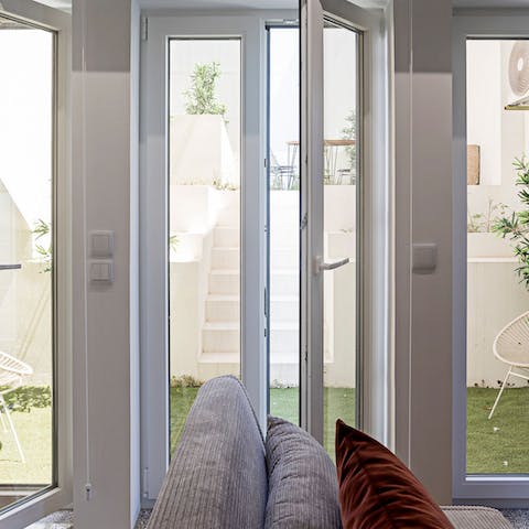 Step out of the living area and into the sunny garden