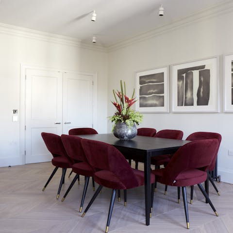 Sit down for brunch in red velvet dining chairs