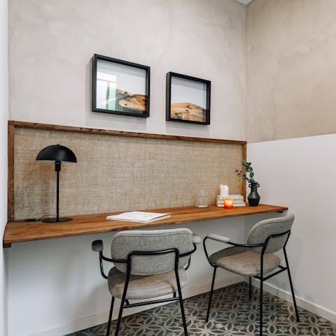 Keep up with work emails at the dedicated desk space