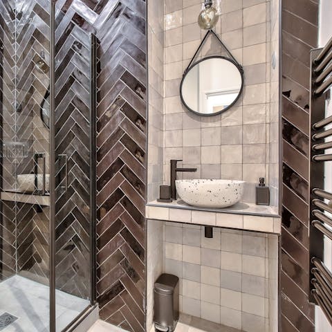 Get ready in the modern bathroom for a night out in Paris