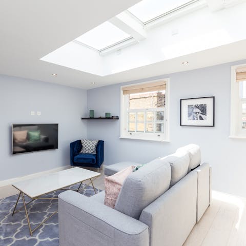 Unwind in the bright living area after a busy day