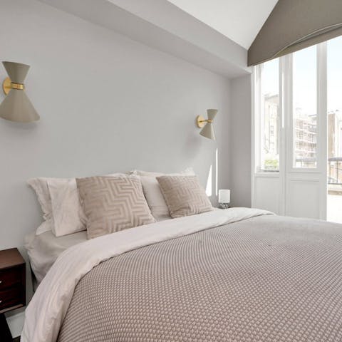 Sink into the comfortable bed after a day of London sightseeing