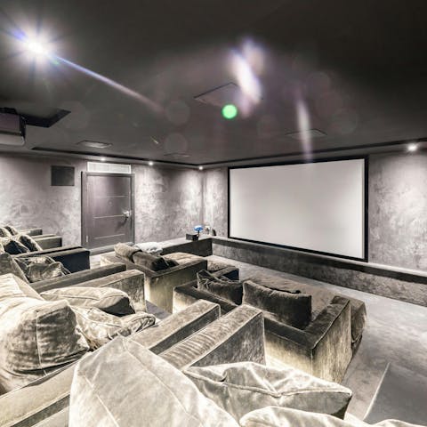 Enjoy movie nights in the plush home cinema