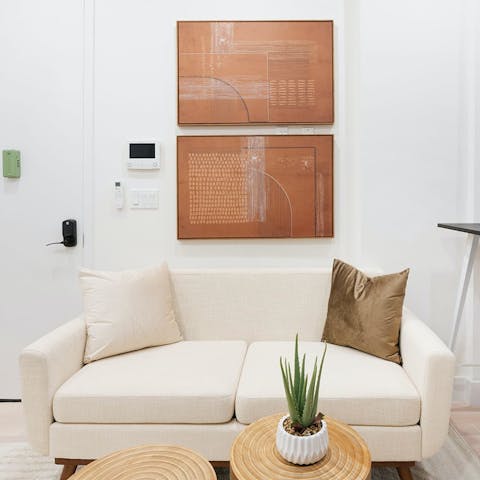 Relax on the sofa after a busy day exploring NYC