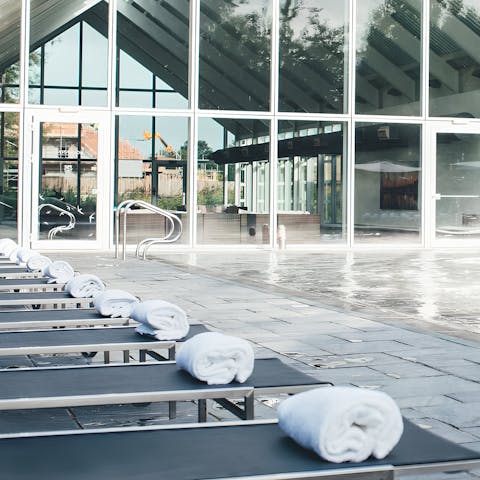 Spend balmy afternoons relaxing by the communal pool