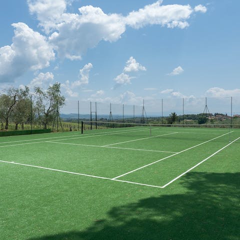 Embrace friendly competition on the private tennis court