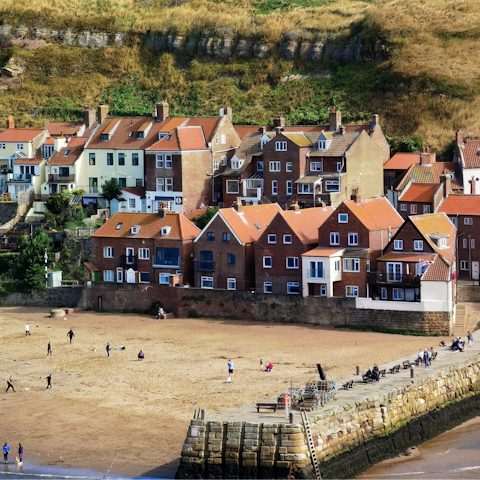 Head to Whitby Beach for an afternoon of sun and sand, a thirteen-minute walk away