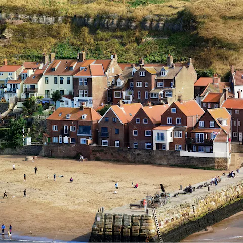 Head to Whitby Beach for an afternoon of sun and sand, a thirteen-minute walk away