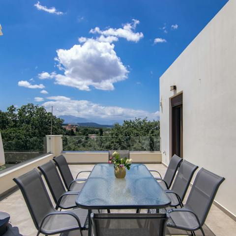 Gather around the outdoor dining table for alfresco feasts in the evenings