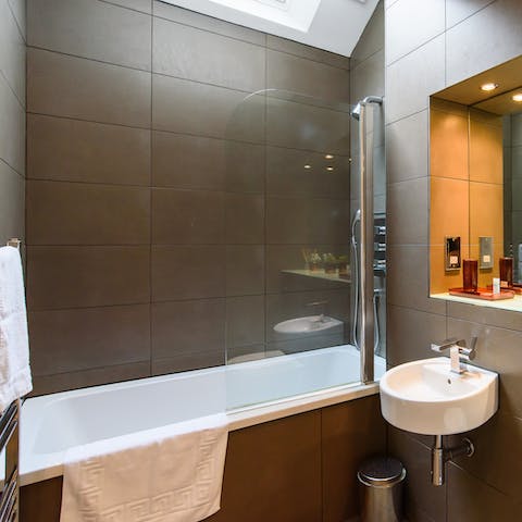 Lock the door and enjoy some uninterrupted me-time in the sleek bathtub