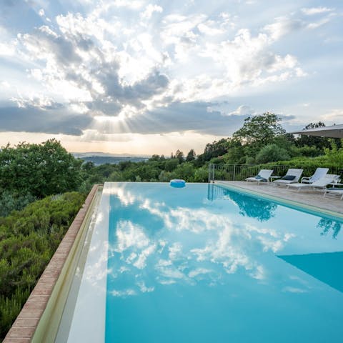Soak up views of rolling hills from the pool