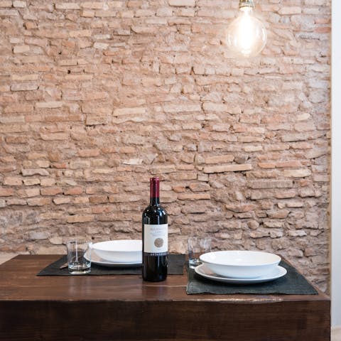 Feel the history of the building through the exposed brickwork