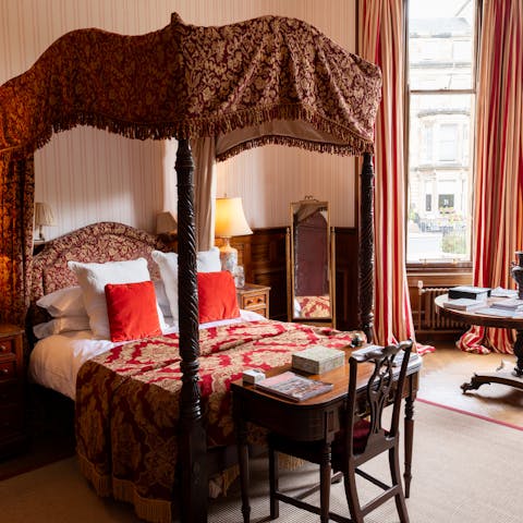 Sleep in a luxurious four-poster bed