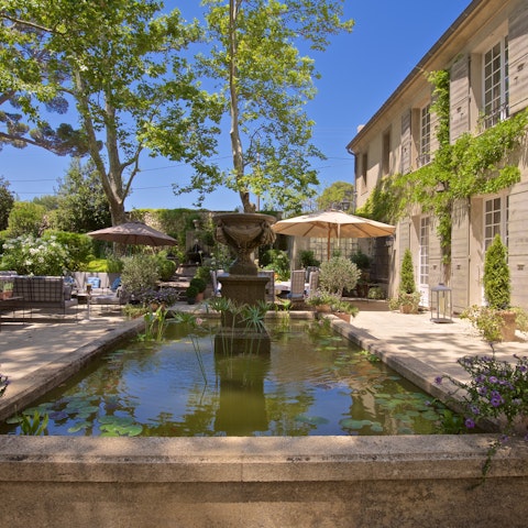 Have a glass of Provence rosé wine and listen to the sound of the fountain