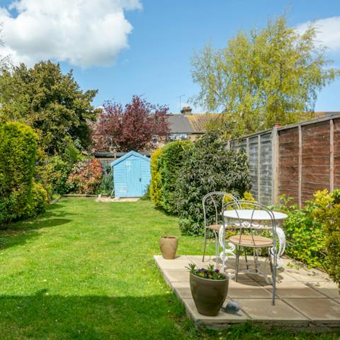 Enjoy a glass of wine in the private garden as the sun goes down