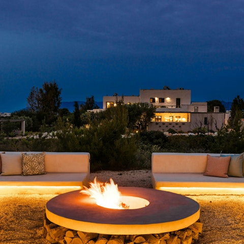 Gather around the fire with a drink in hand