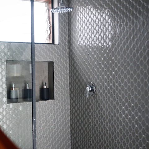 Unwind in the rain shower after a busy day and let the hot water wash away all your tension