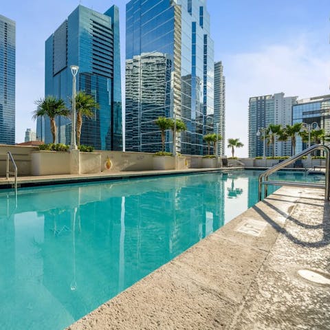 Cool off in the residents only rooftop pool and swim among the skyscrapers