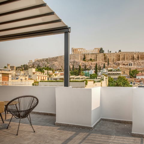 Admire the stunning view of the Acropolis of Athens from the comfort of your private terrace