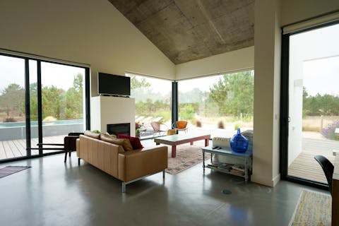 Soak up your home from home's unique design features, including high industrial ceilings and huge floor-to-ceiling windows