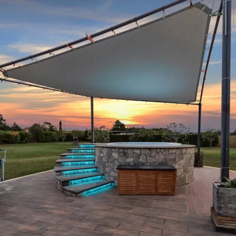Enjoy incredible sunset views across Umbria from the jacuzzi