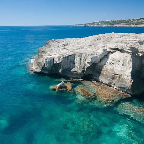 Wander along the shoreline right on your doorstep and marvel at the rocky headlands