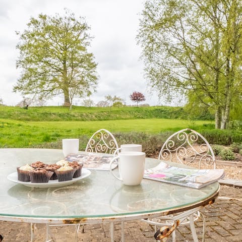 Enjoy your morning coffee with views across open countryside