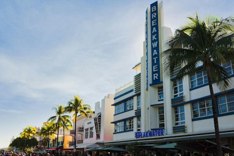 Stroll Ocean Drive's Art Deco buildings and buzzing café scene, about fifteen minutes by car