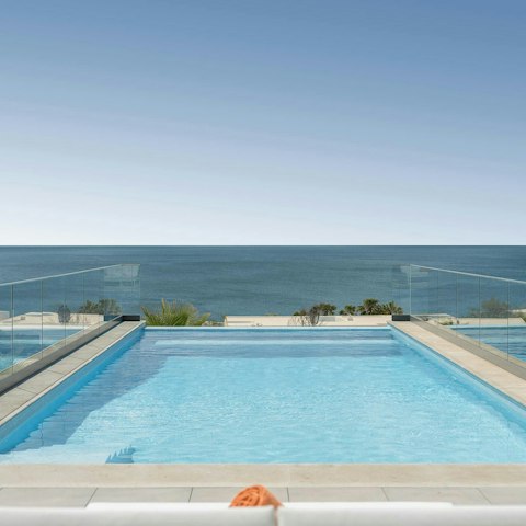 Swim against a backdrop of spectacular sea views