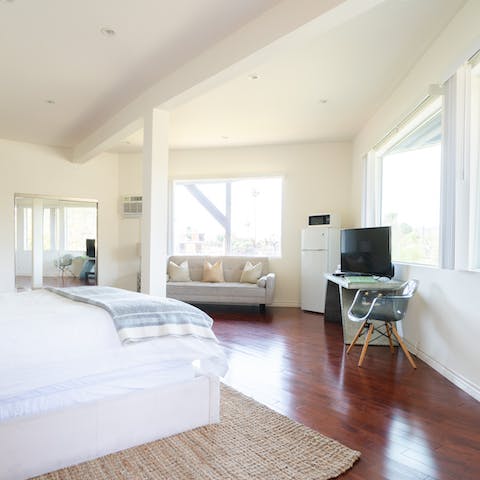 Seclude yourself away in the semi-dettached third bedroom and living space