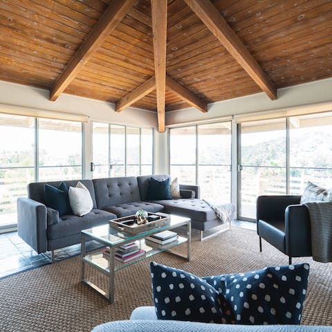 Bask in natural light at any time of day thanks to vast walls of glass