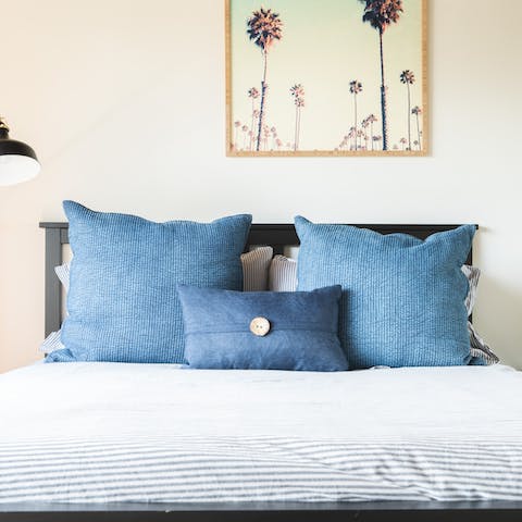 Unwind in the bright and calming bedrooms