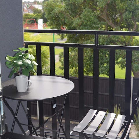 Start your day with coffee out on the balcony and enjoy the lovely green views