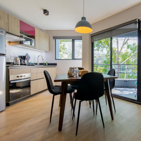 Dine in style in the light-filled kitchen-dining space