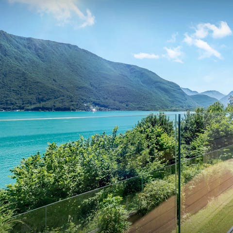 Admire the Lake Annecy views from the balcony