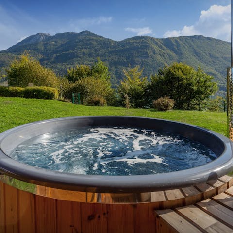 Enjoy a glass of Champagne in the Nordic-style hot tub