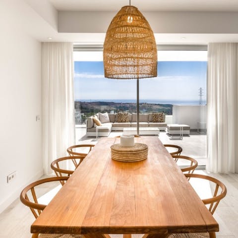 Lay the table for atmospheric evening meals with a sea view
