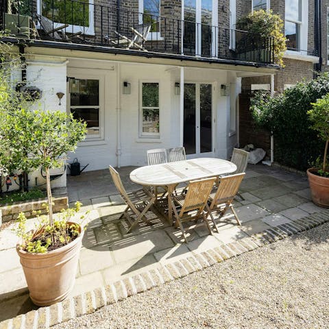 Dine alfresco in the peaceful, private garden