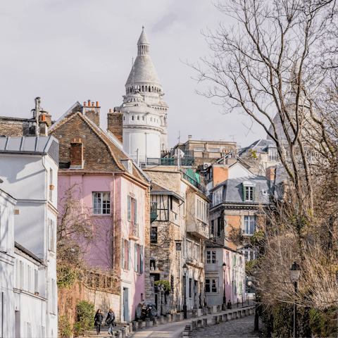 Take a fifteen-minute walk over to explore the picture-perfect streets of Montmartre