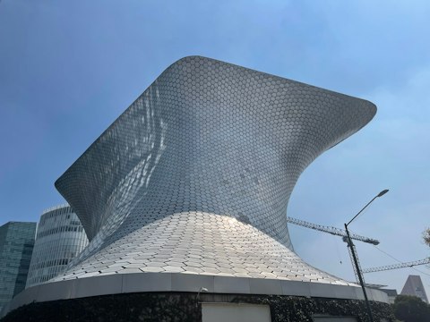 Marvel at Museo Soumaya's world-class art collection, a nineteen-minute walk away