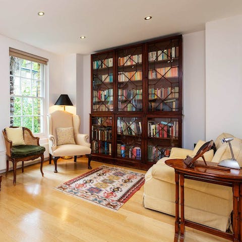 Curl up in the reading room's armchair with a book from the shelves